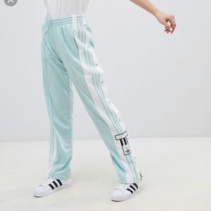 Adidas Pantalon à bouton sur le coté Turquoise !
